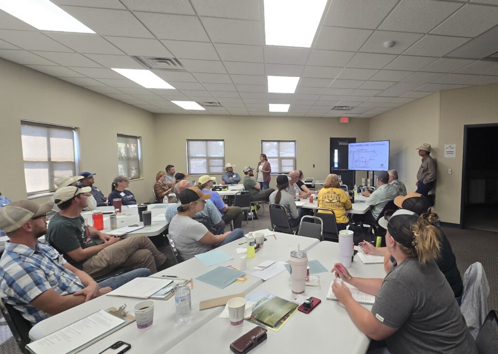 Classroom full of people at the Grazing School